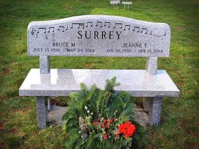 Gray Granite Memorial Bench for Surrey Family with Music Note Carvings