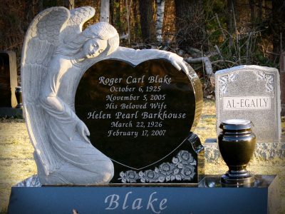 Black Granite Upright Monument shaped like a Heart with an Angels Embrace