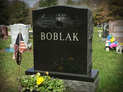 Black Granite Upright Monument Boblak Memorial with Etching of Couple watching Sunset