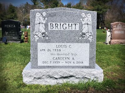 Barre Grey Granite Upright Monument Bright Memorial with Symmetrical Angels Praying Carvings