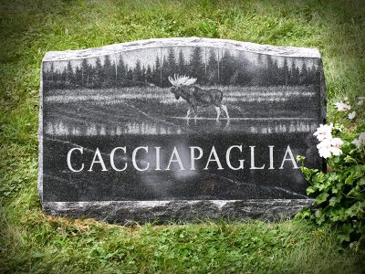 American Black Granite Slant Memorial Cacciapaglia with Detailed Landscape Etching with Moose