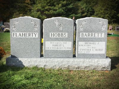 Barre Grey Granite Upright Monument Unique Long Base with Three Upright Memorials for Flaherty Hobbs and Barrett with Flower and Hummingbird Carvings