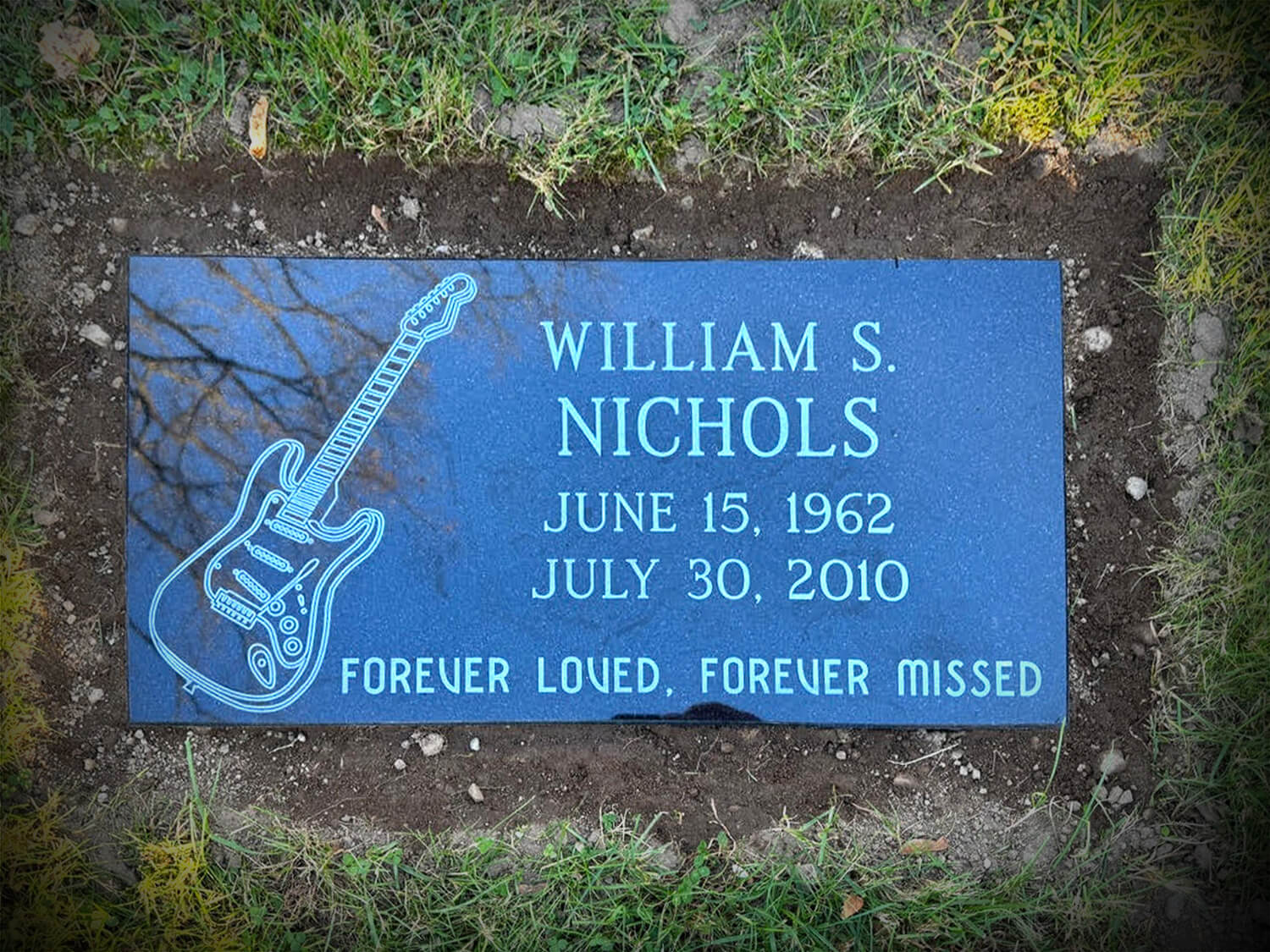 Nichols William Marker with guitar engraving